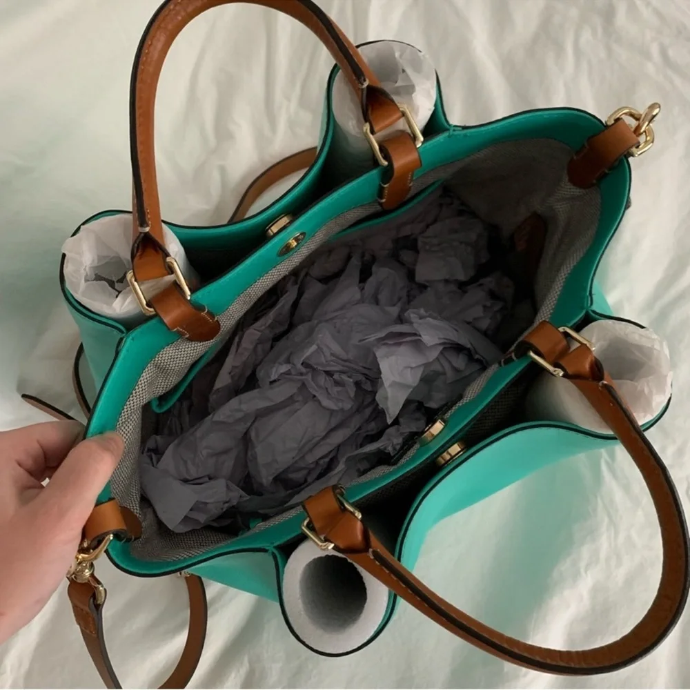 Dooney & Bourke southwest Turquoise Barlow purse
Like New !!!!!! SALE!!!!!!! - Picture 5 of 11